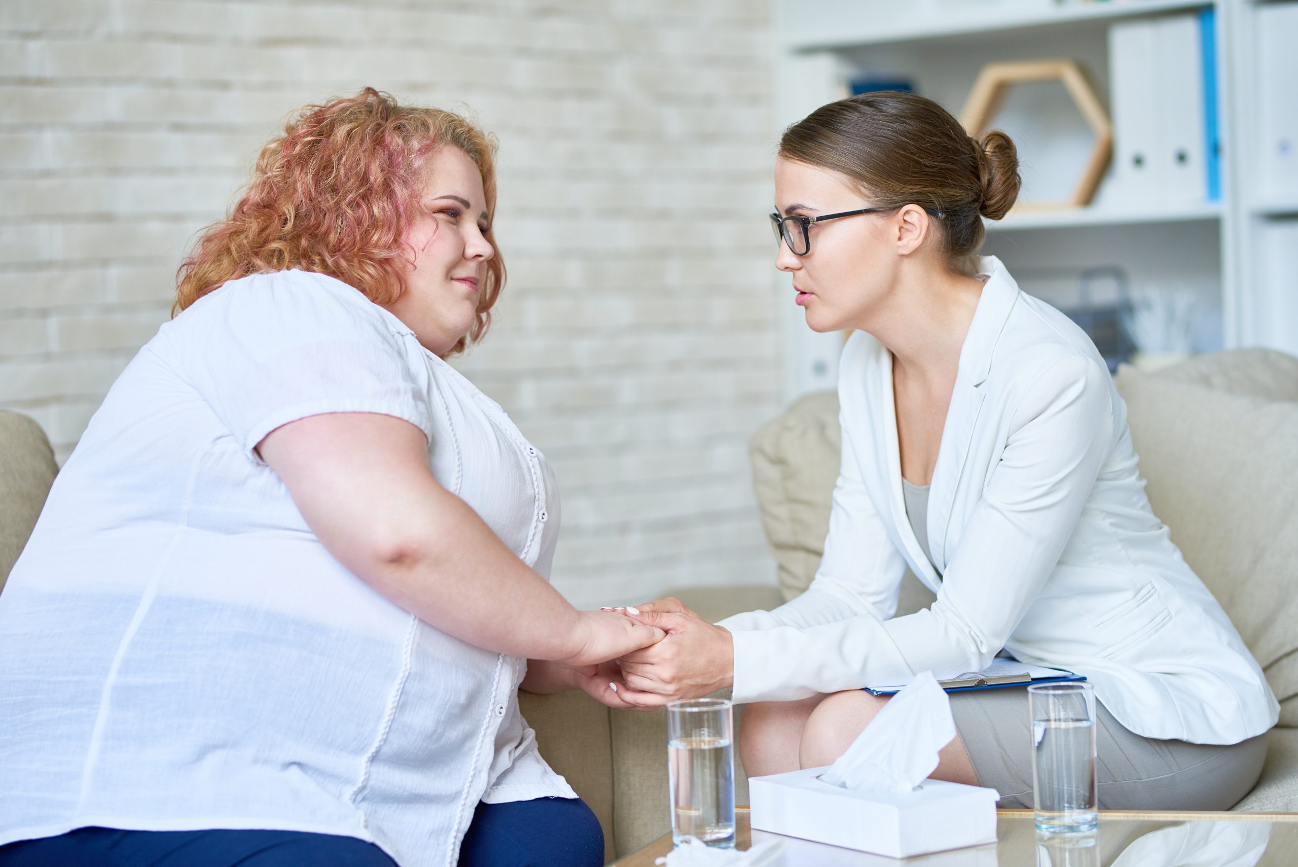 Obese young Woman in Psychotherapy Session