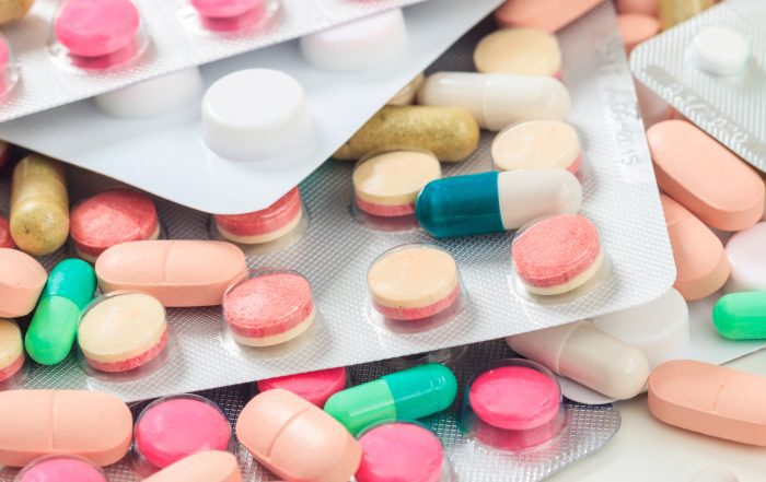 Medicine, medication. Colorful pills and capsules background, banner